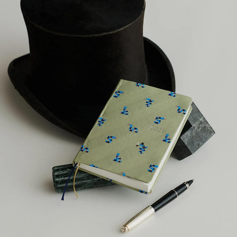 Bow + Tie HON 2025 Planner, Snake Toy
