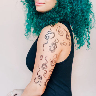 Unfurling Tattoo Sheets