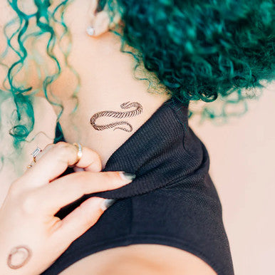 Unfurling Tattoo Sheets