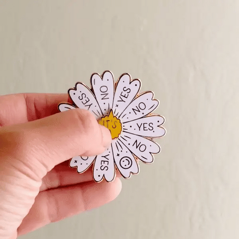 Spinning Daisy Enamel Pin